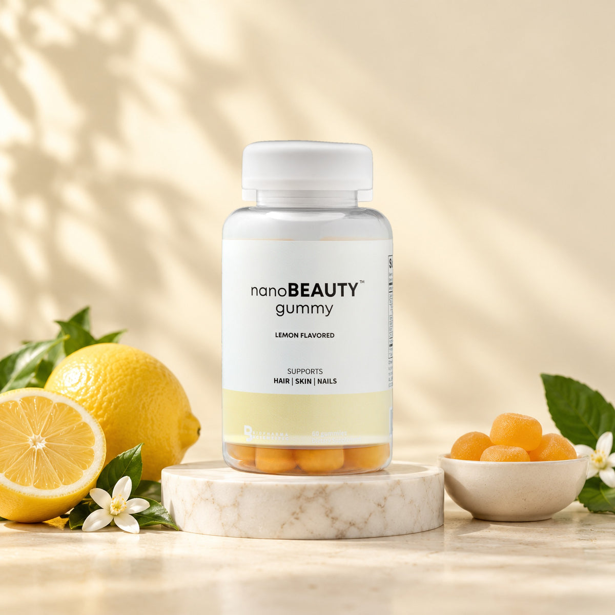 NanoBeauty Gummies jar in a bright studio still life with fresh ingredients